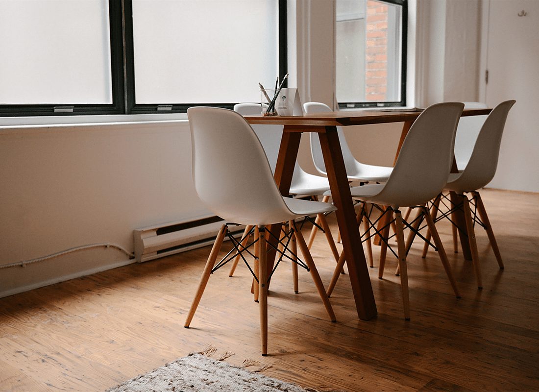 Daylight meeting room with an empty table