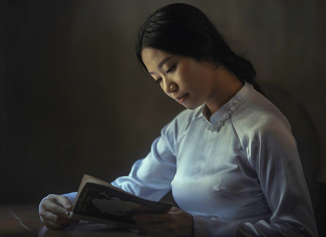 Professional reading a document in a quiet office